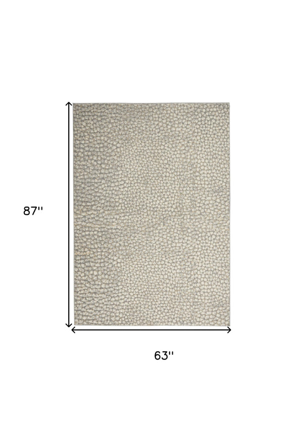 Homeroots 5' X 7' Beige And Gray Animal Print Power Loom Area Rug  Polypropylene,Polyester 550331