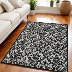 Homeroots 5' X 7' Ivory And Black Damask Distressed Area Rug  Cotton,Polyester 550377