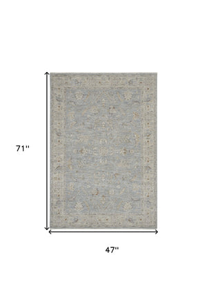 Homeroots 4' X 6' Beige And Blue Floral Power Loom Area Rug  Polypropylene,Polyester 550380