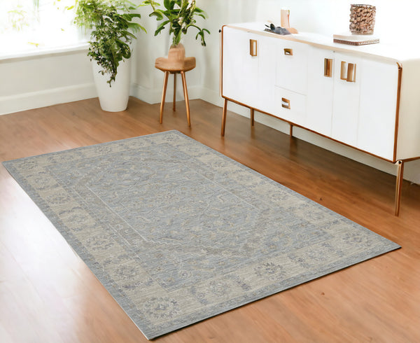 Homeroots 4' X 6' Beige And Blue Floral Power Loom Area Rug  Polypropylene,Polyester 550381