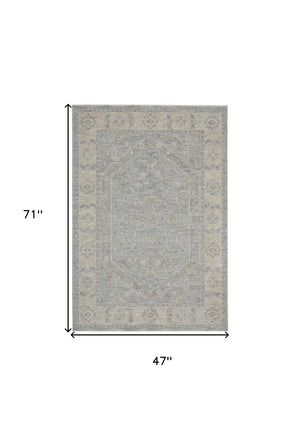 Homeroots 4' X 6' Beige And Blue Floral Power Loom Area Rug  Polypropylene,Polyester 550381