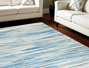 Homeroots 6' X 9' Ivory Blue And Gray Abstract Non Skid Area Rug  Polypropylene 550384