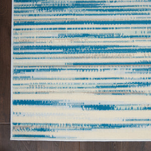 Homeroots 6' X 9' Ivory Blue And Gray Abstract Non Skid Area Rug  Polypropylene 550384