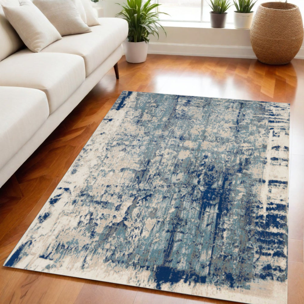 Homeroots 5' X 7' Ivory Blue And Slate Gray Abstract Non Skid Area Rug  Polyester 550393