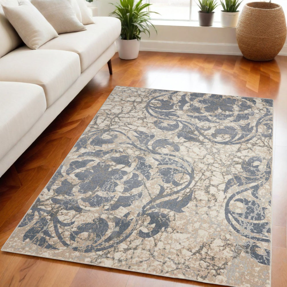 Homeroots 5' X 7' Ivory Charcoal And Gray Floral Distressed Non Skid Area Rug  Polyester 550395