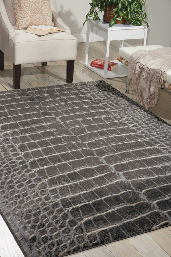 Homeroots 5' X 7' Beige Charcoal And Cream Animal Print Distressed Non Skid Area Rug  Polyester 550420