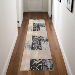 Homeroots 8' Tan Black And Ivory Floral Vines Non Skid Runner Rug  Polyester 550424