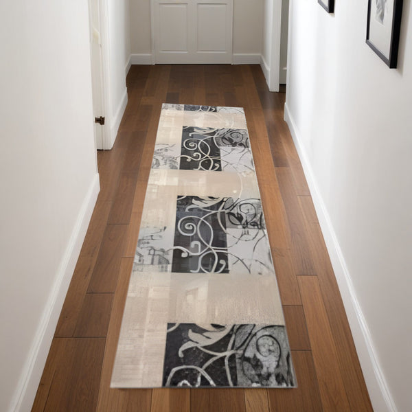 Homeroots 8' Tan Black And Ivory Floral Vines Non Skid Runner Rug  Polyester 550424