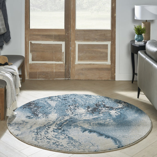 HomeRoots 5' Teal and Ivory Abstract Round Rug – Stylish, Stain-Resistant, Non-Skid Design for Any Room! 5' Round 550442