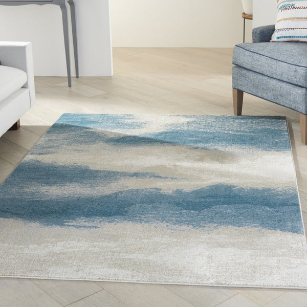 HomeRoots 5' Teal and Ivory Abstract Area Rug – Stain-Resistant, Non-Skid, Durable Design for Modern Spaces 5' X 7' 550444