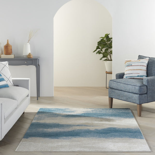HomeRoots 5' Teal and Ivory Abstract Area Rug – Stain-Resistant, Non-Skid, Durable Design for Modern Spaces 5' X 7' 550444