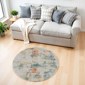 Homeroots 4' Ivory Blue And Orange Abstract Distressed Non Skid Round Rug  Polypropylene,Polyester 550472