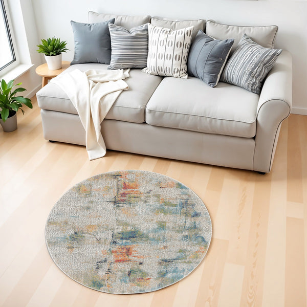 Homeroots 4' Ivory Blue And Orange Abstract Distressed Non Skid Round Rug  Polypropylene,Polyester 550472
