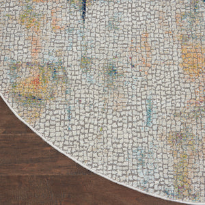 Homeroots 4' Ivory Blue And Orange Abstract Distressed Non Skid Round Rug  Polypropylene,Polyester 550472