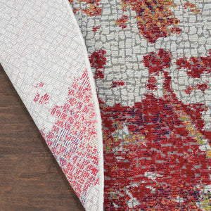 Homeroots 4' Ivory Red And Blue Abstract Distressed Non Skid Round Rug  Polypropylene,Polyester 550473