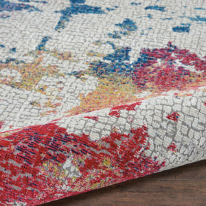 Homeroots 4' Ivory Red And Blue Abstract Distressed Non Skid Round Rug  Polypropylene,Polyester 550473