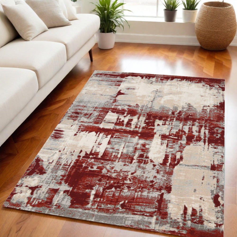 Homeroots 5' X 7' Ivory Red And Gray Abstract Non Skid Area Rug  Polyester 550569