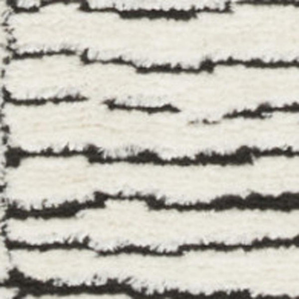HomeRoots 5' Modern Ivory and Black Geometric Area Rug - Stylish, Durable Design for High-Traffic Spaces 5' X 7' 550590