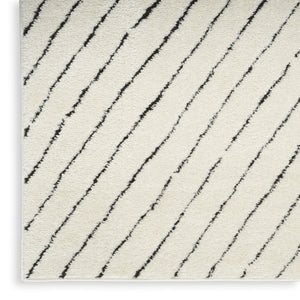 HomeRoots 5' X 7' Ivory and Black Abstract Area Rug - Durable, Stain-Resistant, Modern Design for High-Traffic Homes 550592