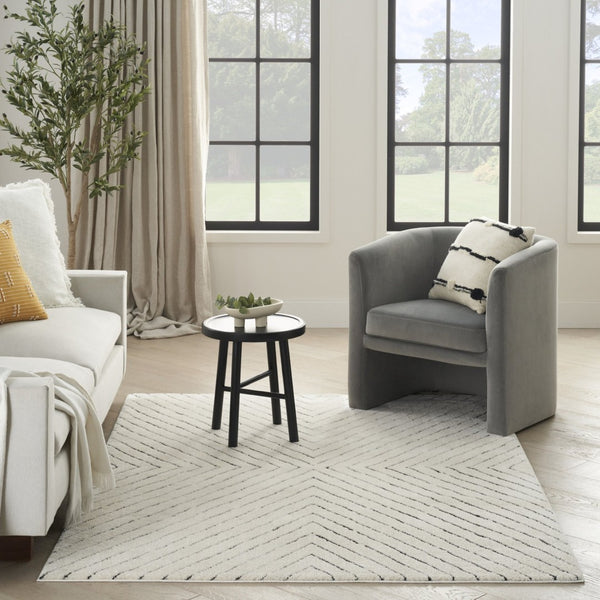 HomeRoots 5' X 7' Ivory and Black Abstract Area Rug - Durable, Stain-Resistant, Modern Design for High-Traffic Homes 550592