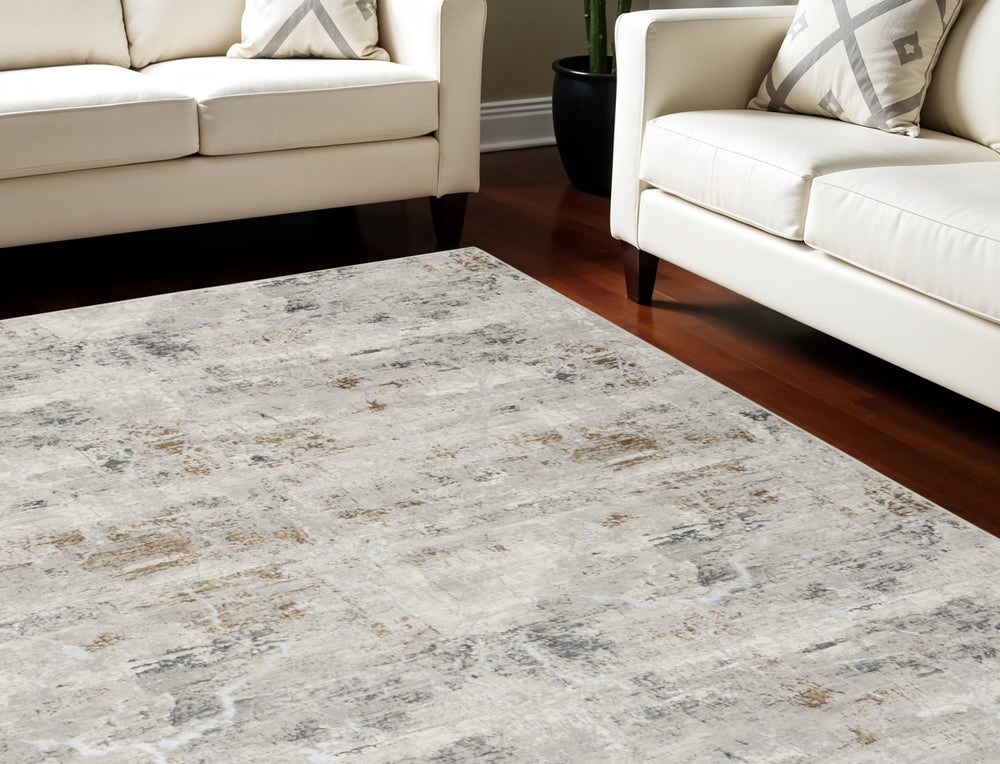 Homeroots 8' X 10' Ivory Gray And Brown Abstract Non Skid Area Rug  Polyester 550597