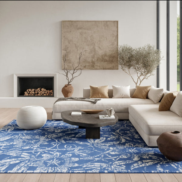 HomeRoots 7' Ivory and Blue Floral Distressed Area Rug - Timeless Charm for High-Traffic Spaces and Homes 7' X 10' 550616