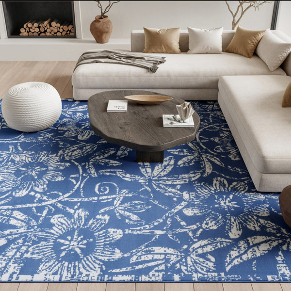 HomeRoots 7' Ivory and Blue Floral Distressed Area Rug - Timeless Charm for High-Traffic Spaces and Homes 7' X 10' 550616