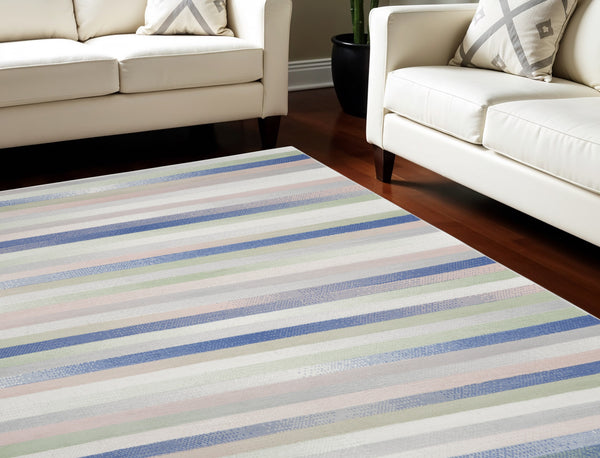 Homeroots 7' X 10' Ivory Tan And Blue Abstract Distressed Non Skid Area Rug  Polypropylene 550623