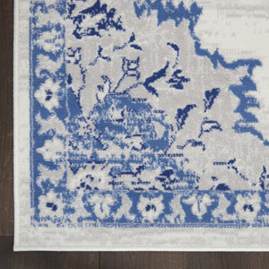 HomeRoots 7' Distressed Floral Medallion Area Rug in Ivory and Blue – Stain-Resistant, Non-Skid Comfort 7' X 10' 550625