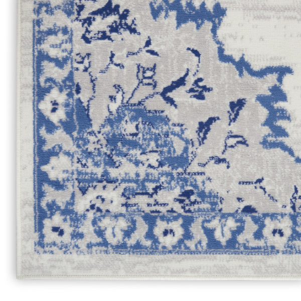 HomeRoots 7' Distressed Floral Medallion Area Rug in Ivory and Blue – Stain-Resistant, Non-Skid Comfort 7' X 10' 550625