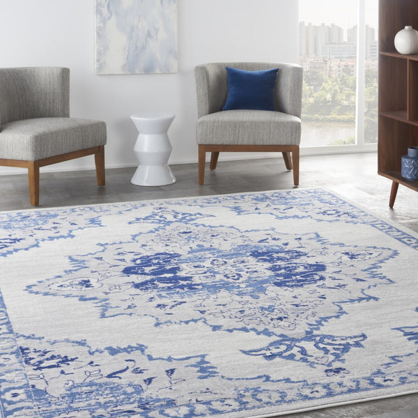 HomeRoots 7' Distressed Floral Medallion Area Rug in Ivory and Blue – Stain-Resistant, Non-Skid Comfort 7' X 10' 550625