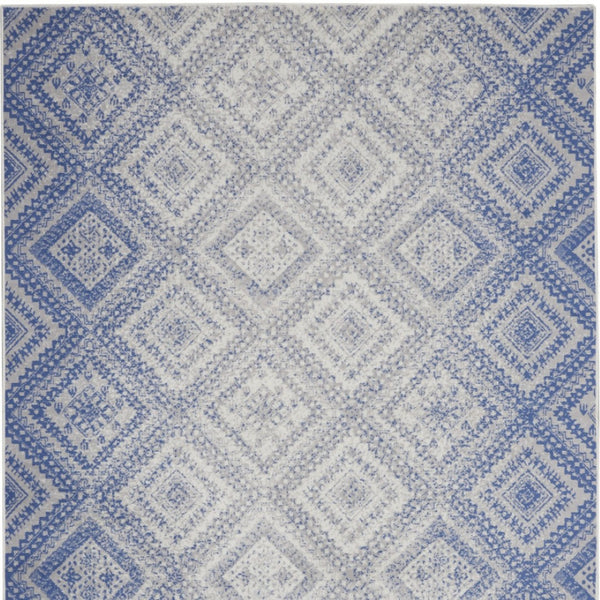 Homeroots 7' Ivory And Blue Geometric Distressed Non-skid Area Rug - Durable, Stain-resistant Comfort For Homes 7' X 10' Polyester 550626