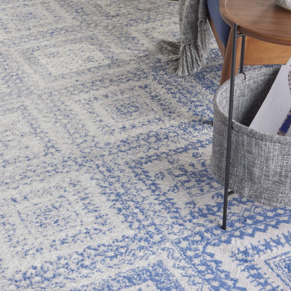 Homeroots 7' Ivory And Blue Geometric Distressed Non-skid Area Rug - Durable, Stain-resistant Comfort For Homes 7' X 10' Polyester 550626