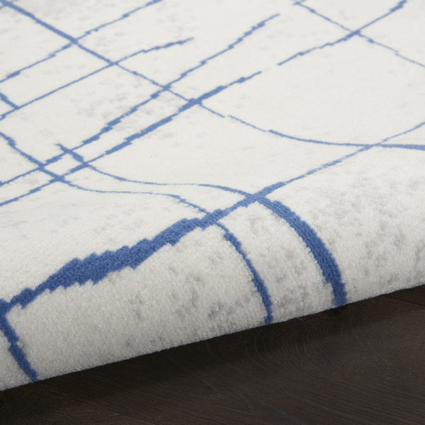 HomeRoots 7' Elegant Ivory and Blue Abstract Distressed Area Rug - Durable, Stain-Resistant, Stylish Design 7' X 10' 550635