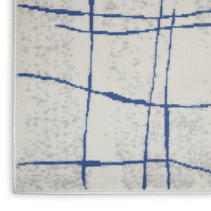 HomeRoots 7' Elegant Ivory and Blue Abstract Distressed Area Rug - Durable, Stain-Resistant, Stylish Design 7' X 10' 550635