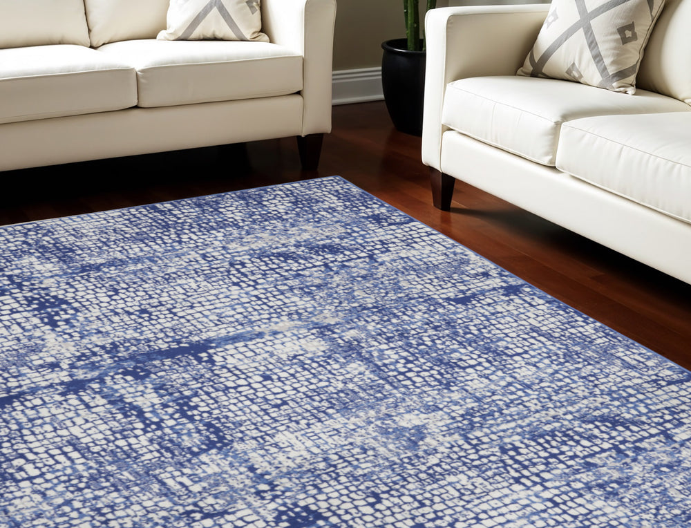 Homeroots 7' X 10' Ivory And Navy Blue Abstract Distressed Non Skid Area Rug  Polypropylene 550637