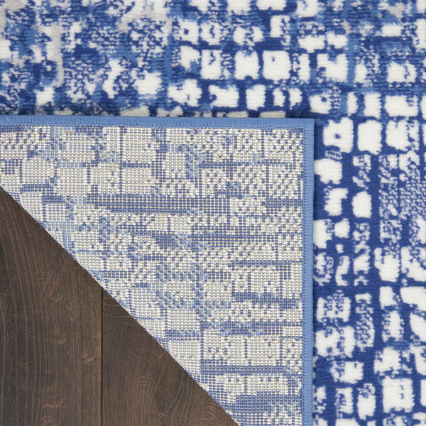 Homeroots 7' X 10' Ivory And Navy Blue Abstract Distressed Non Skid Area Rug  Polypropylene 550637