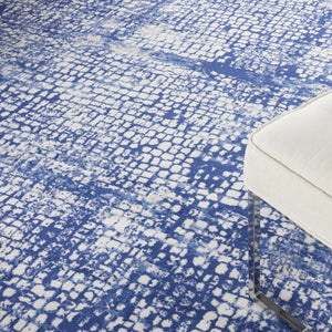 Homeroots 7' X 10' Ivory And Navy Blue Abstract Distressed Non Skid Area Rug  Polypropylene 550637