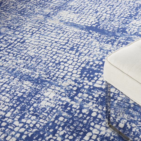 Homeroots 7' X 10' Ivory And Navy Blue Abstract Distressed Non Skid Area Rug  Polypropylene 550637