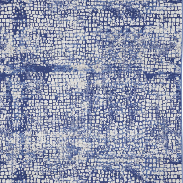 Homeroots 7' X 10' Ivory And Navy Blue Abstract Distressed Non Skid Area Rug  Polypropylene 550637