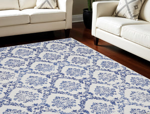 Homeroots 7' X 10' Ivory And Navy Blue Damask Distressed Non Skid Area Rug  Polypropylene 550639