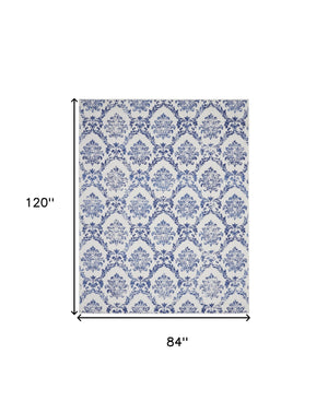 Homeroots 7' X 10' Ivory And Navy Blue Damask Distressed Non Skid Area Rug  Polypropylene 550639