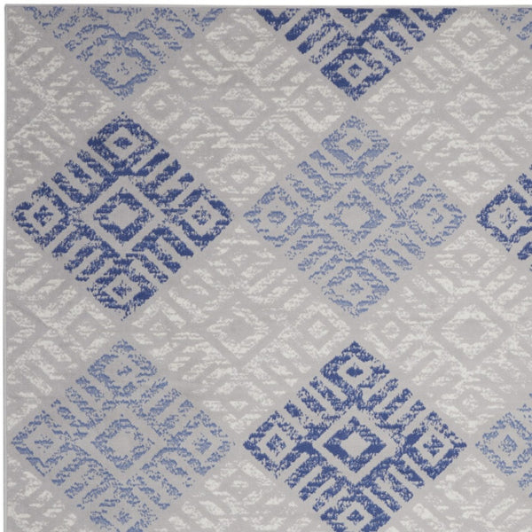 Homeroots 7' Stylish Geometric Distressed Area Rug In Beige, Blue & Gray – Durable, Non-skid, Stain Resistant 7' X 10' Polypropylene 550664