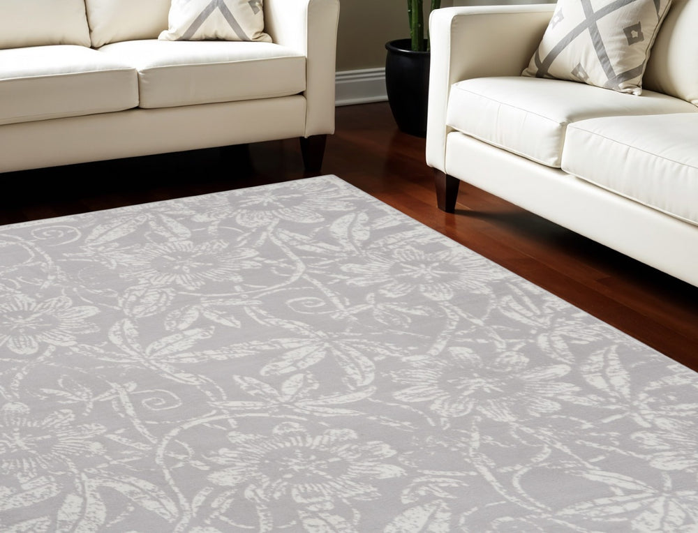 HomeRoots 7' Ivory and Gray Floral Distressed Area Rug - Durable, Stain-Resistant Design for Every Room 7' X 10' 550669