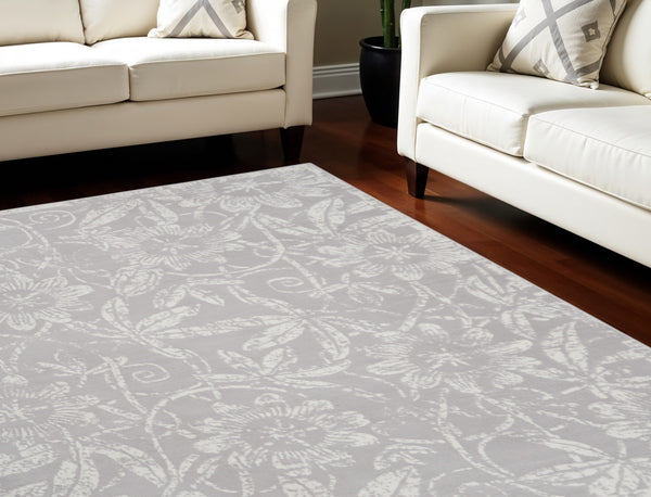 Homeroots 7' Ivory And Gray Floral Distressed Non-skid Area Rug - Perfect For Pets, Stain-resistant & Durable 7' X 10' Polyester 550669