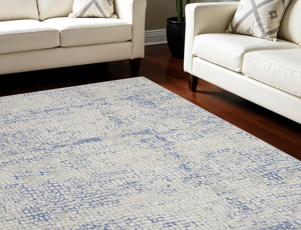 Homeroots 7' Abstract Ivory Blue And Gray Distressed Non-skid Area Rug - Durable, Stain-resistant Design For Home 7' X 10' Polyester 550670