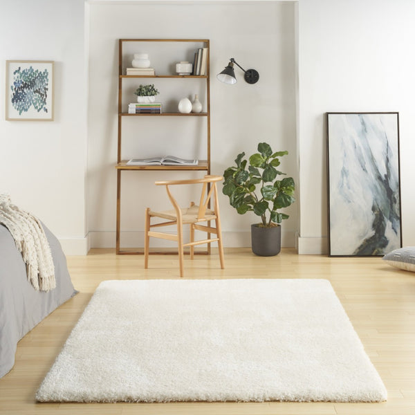 HomeRoots 4' Ivory Shag Area Rug - Luxuriously Soft, Durable & Versatile for Cozy Spaces, Kids & Pets Friendly 4' X 6' 550695