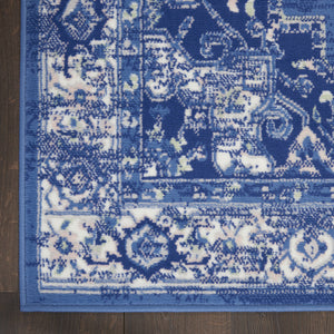 Homeroots 7' X 10' Ivory Navy Blue And Beige Floral Medallion Distressed Non Skid Area Rug  Polypropylene 550704