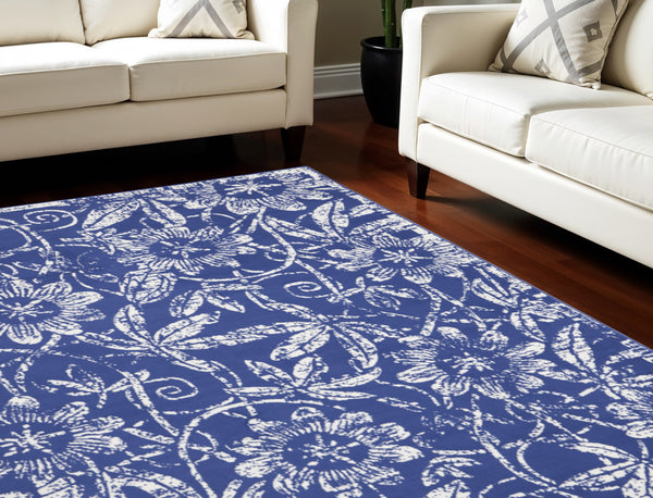 Homeroots 7' X 10' Ivory And Navy Blue Floral Distressed Non Skid Area Rug  Polypropylene 550706