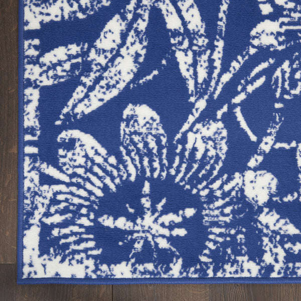 Homeroots 7' X 10' Ivory And Navy Blue Floral Distressed Non Skid Area Rug  Polypropylene 550706